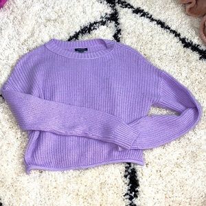 Purple sweater.